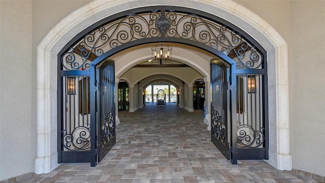 5622 Arnie Loop, Lakewood Ranch, FL 34211 - view of exterior entry with a gate and stucco siding