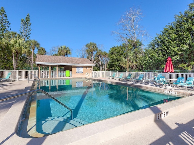 4869 Village Gardens Dr Unit 189, Sarasota, FL 34234 - community pool featuring a patio area