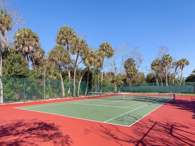 4869 Village Gardens Dr Unit 189, Sarasota, FL 34234 - view of tennis court with community basketball court