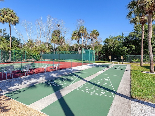 4869 Village Gardens Dr Unit 189, Sarasota, FL 34234 - view of community featuring a tennis court and shuffleboard