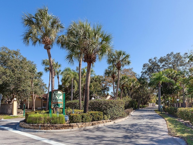 4869 Village Gardens Dr Unit 189, Sarasota, FL 34234 - view of asphalt road with curbs