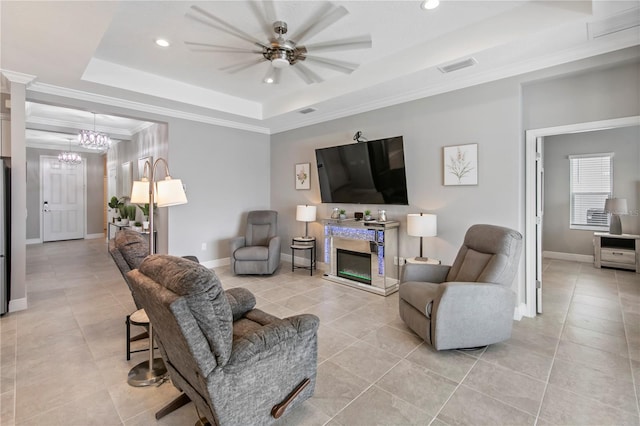 4406 Rustling Pines Ter, Parrish, FL 34219 - living area with a tray ceiling, light tile patterned floors, recessed lighting, baseboards, and a ceiling fan