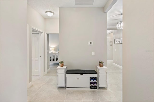 4406 Rustling Pines Ter, Parrish, FL 34219 - hallway with light tile patterned floors
