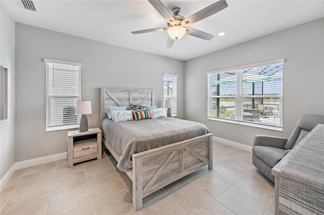 4406 Rustling Pines Ter, Parrish, FL 34219 - bedroom with baseboards, light tile patterned flooring, a ceiling fan, and recessed lighting