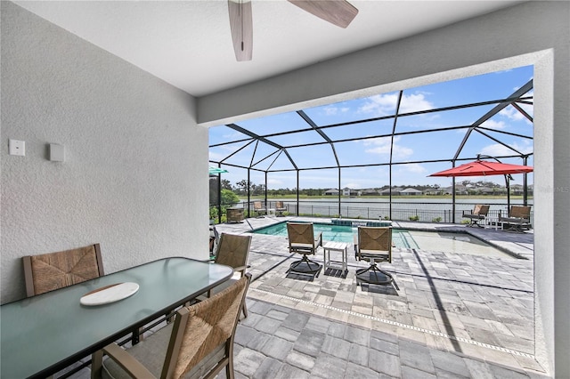4406 Rustling Pines Ter, Parrish, FL 34219 - view of patio / terrace with ceiling fan, an outdoor pool, outdoor dining space, and glass enclosure