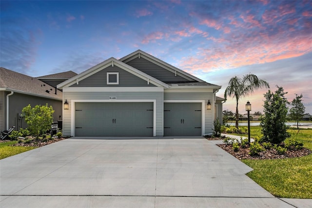 4406 Rustling Pines Ter, Parrish, FL 34219 - view of front of property featuring driveway and a garage