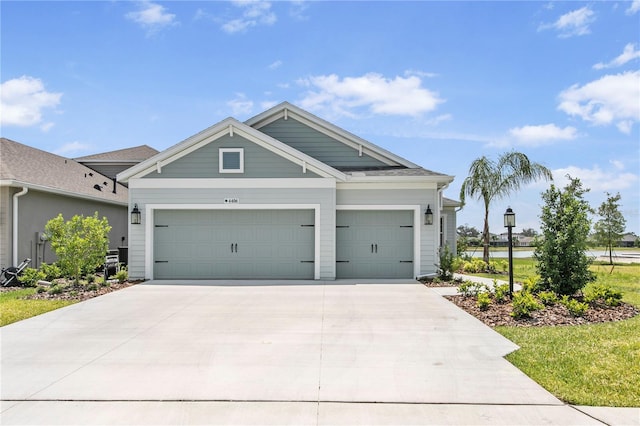 4406 Rustling Pines Ter, Parrish, FL 34219 - view of front of property featuring driveway and a garage