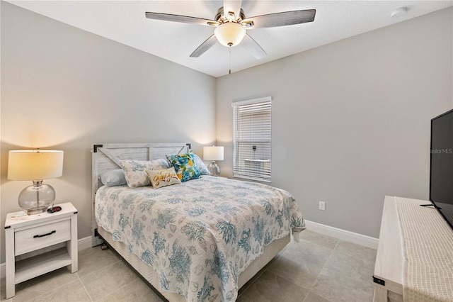 4406 Rustling Pines Ter, Parrish, FL 34219 - bedroom with baseboards, tile patterned floors, and ceiling fan