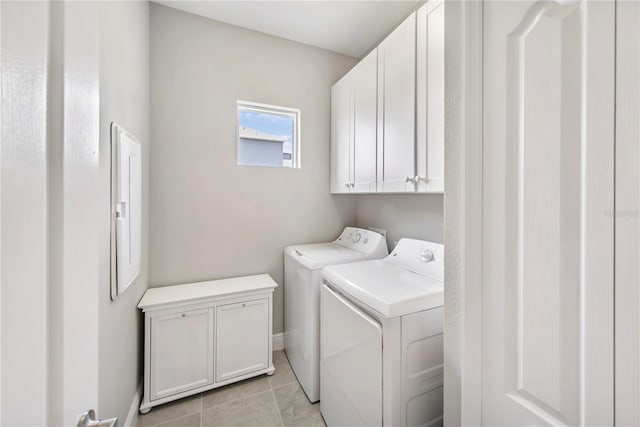 4406 Rustling Pines Ter, Parrish, FL 34219 - laundry room featuring cabinet space, independent washer and dryer, and light tile patterned floors