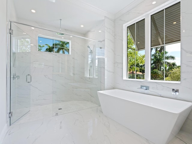 430 Pheasant Way, Sarasota, FL 34236 - full bathroom featuring marble tiled flooring, a marble finish shower, a freestanding tub, and ornamental molding