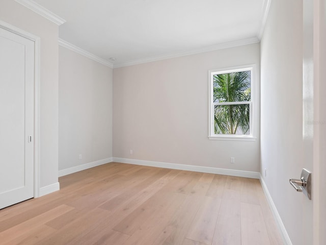 430 Pheasant Way, Sarasota, FL 34236 - empty room featuring light wood-style floors and crown molding