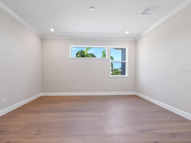 430 Pheasant Way, Sarasota, FL 34236 - spare room with ornamental molding, recessed lighting, and light wood finished floors