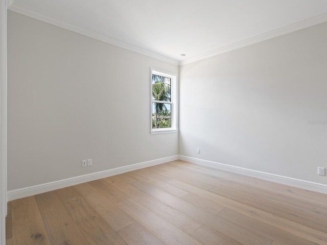 430 Pheasant Way, Sarasota, FL 34236 - unfurnished room with crown molding and light wood finished floors