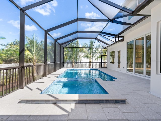 430 Pheasant Way, Sarasota, FL 34236 - view of swimming pool featuring a patio, glass enclosure, and a fenced backyard
