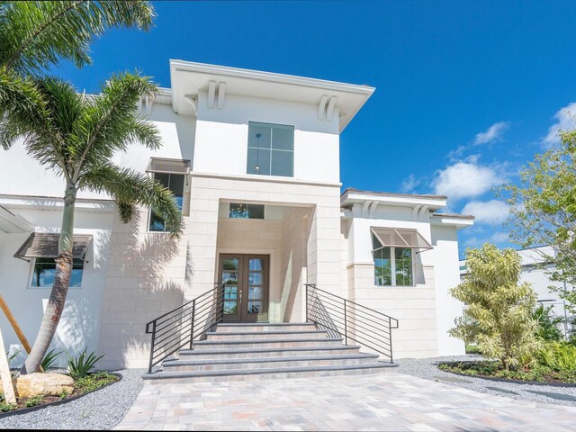 430 Pheasant Way, Sarasota, FL 34236 - view of exterior entry featuring french doors