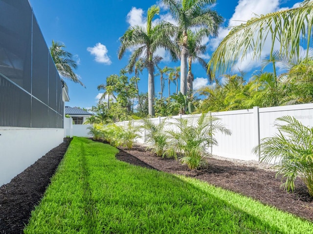430 Pheasant Way, Sarasota, FL 34236 - fenced backyard with glass enclosure