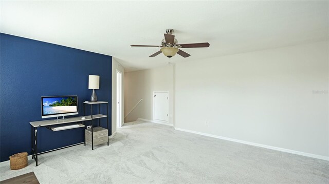 7379 47th Avenue Cir E, Bradenton, FL 34203 - sitting room featuring an upstairs landing, carpet, ceiling fan, and baseboards