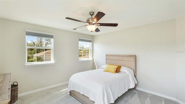 7379 47th Avenue Cir E, Bradenton, FL 34203 - bedroom with carpet flooring, baseboards, and ceiling fan