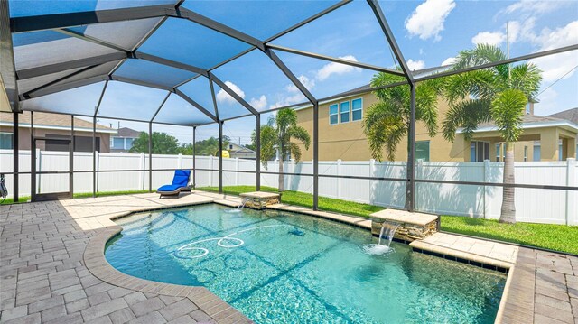 7379 47th Avenue Cir E, Bradenton, FL 34203 - view of swimming pool featuring a patio, a fenced backyard, and glass enclosure