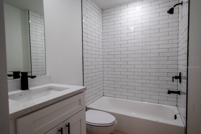 bathroom featuring toilet, shower / bath combination, and vanity