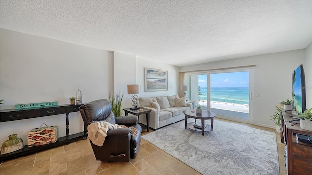 19 Whispering Sands Dr Unit 805, Sarasota, FL 34242 - living room with a textured ceiling