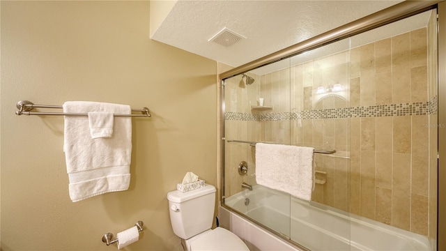 19 Whispering Sands Dr Unit 805, Sarasota, FL 34242 - bathroom with toilet and shower / bath combination with glass door