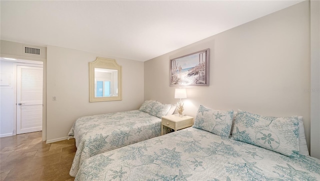 19 Whispering Sands Dr Unit 805, Sarasota, FL 34242 - bedroom featuring baseboards