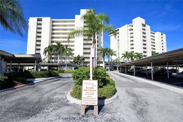 19 Whispering Sands Dr Unit 805, Sarasota, FL 34242 - view of apartment building / complex with covered parking