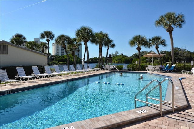 19 Whispering Sands Dr Unit 805, Sarasota, FL 34242 - community pool featuring a patio