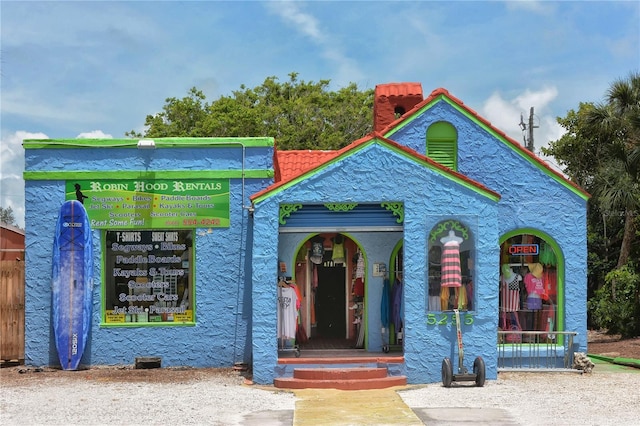 19 Whispering Sands Dr Unit 805, Sarasota, FL 34242 - view of front of home with a chimney