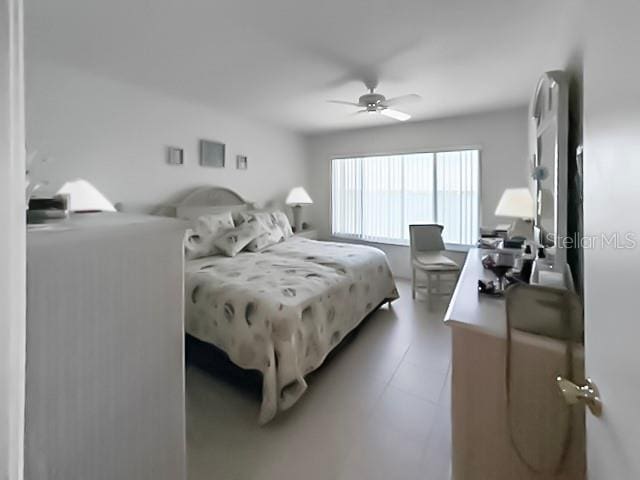 8977 Midnight Pass Rd Unit 521, Sarasota, FL 34242 - bedroom featuring ceiling fan