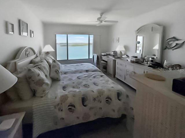 8977 Midnight Pass Rd Unit 521, Sarasota, FL 34242 - bedroom featuring a ceiling fan