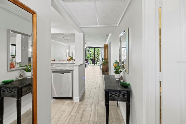 157 Pinehurst Dr Unit 157, Bradenton, FL 34210 - hallway featuring light wood-type flooring and baseboards