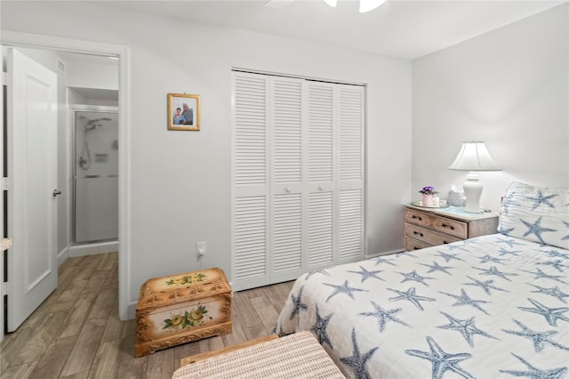 157 Pinehurst Dr Unit 157, Bradenton, FL 34210 - bedroom with a closet, light wood-style floors, and ceiling fan