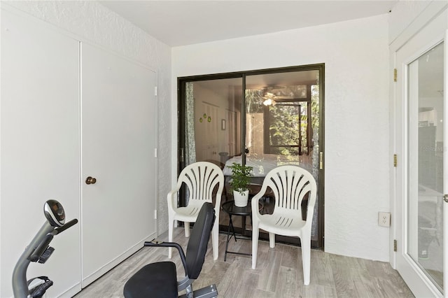 157 Pinehurst Dr Unit 157, Bradenton, FL 34210 - exercise room with light wood finished floors