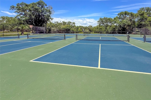 157 Pinehurst Dr Unit 157, Bradenton, FL 34210 - view of tennis court with community basketball court