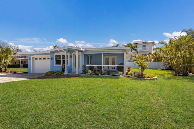 view of front of house featuring an attached garage, driveway, stucco siding, and french doors