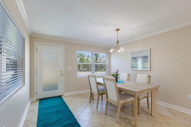 dining area with a chandelier, crown molding, a textured ceiling, baseboards, and light tile patterned floors