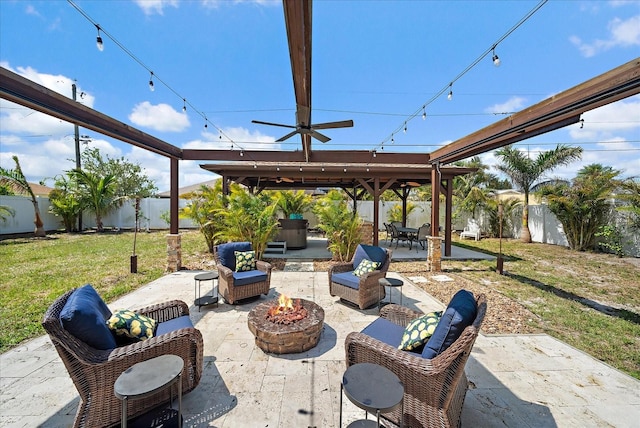 9089 Berendo Ave, Englewood, FL 34224 - view of patio featuring ceiling fan, an outdoor living space with a fire pit, and outdoor dining area