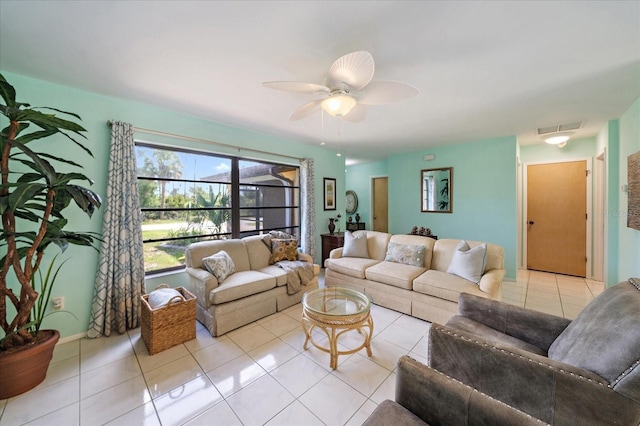 9089 Berendo Ave, Englewood, FL 34224 - living room with tile patterned flooring and a ceiling fan