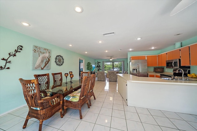 9089 Berendo Ave, Englewood, FL 34224 - dining space with light tile patterned floors, recessed lighting, and ceiling fan