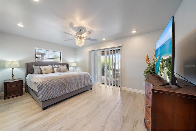 9089 Berendo Ave, Englewood, FL 34224 - bedroom featuring multiple windows, light wood-style floors, baseboards, recessed lighting, and a ceiling fan
