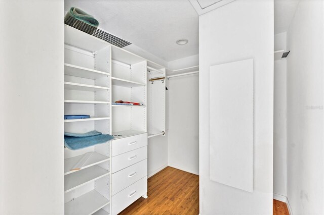 919 Palm View Way, Sarasota, FL 34240 - spacious closet featuring wood finished floors
