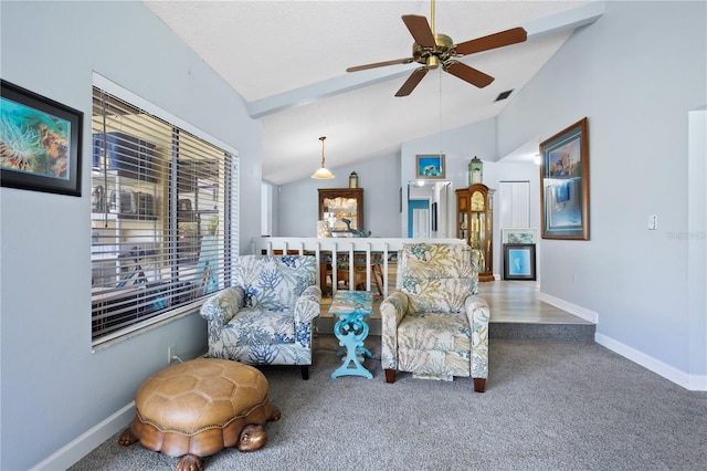 4203 Carriage Dr Unit 27, Sarasota, FL 34241 - sitting room with vaulted ceiling, carpet floors, ceiling fan, and baseboards