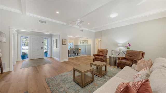 4665 Pine Harrier Dr, Sarasota, FL 34231 - living room featuring wood finished floors, a ceiling fan, baseboards, beamed ceiling, and recessed lighting