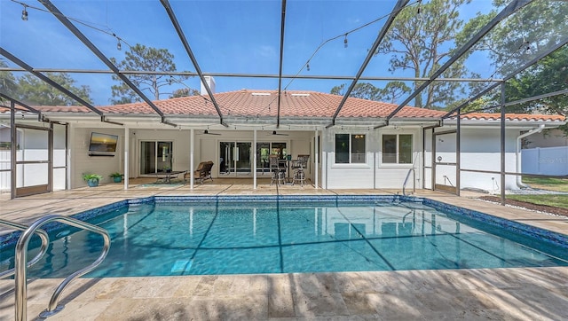 4665 Pine Harrier Dr, Sarasota, FL 34231 - swimming pool featuring a patio, a ceiling fan, and glass enclosure
