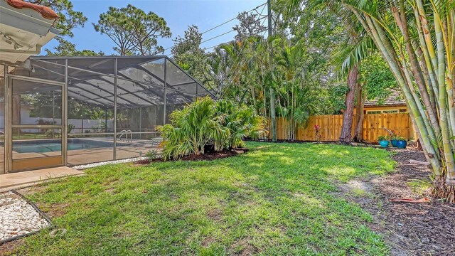 4665 Pine Harrier Dr, Sarasota, FL 34231 - view of yard featuring a patio area