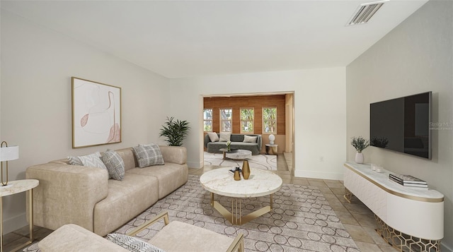 755 Edgemere Ln, Sarasota, FL 34242 - living area featuring baseboards and tile patterned floors