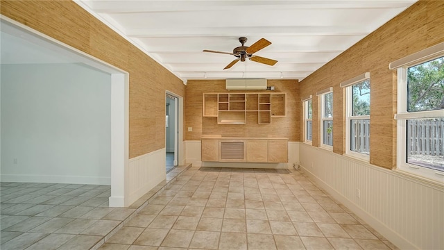 755 Edgemere Ln, Sarasota, FL 34242 - unfurnished sunroom featuring beam ceiling and a wall mounted AC