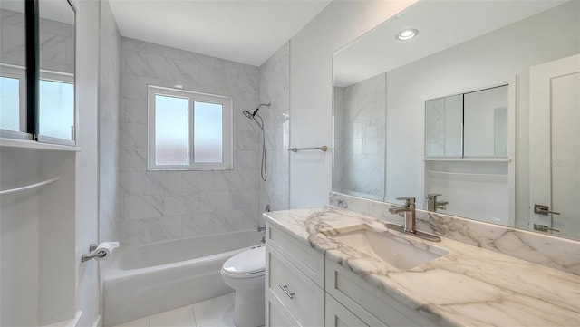 755 Edgemere Ln, Sarasota, FL 34242 - bathroom with vanity, shower / bath combination, toilet, and tile patterned flooring